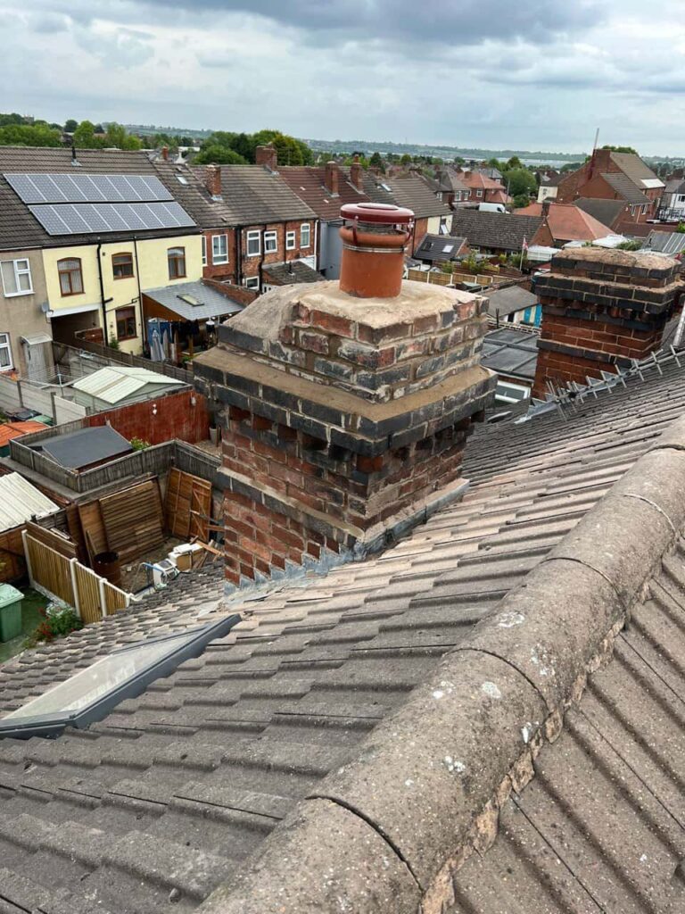 This is a photo taken from a roof which is being repaired by Edenbridge Roofing Repairs, it shows a street of houses, and their roofs